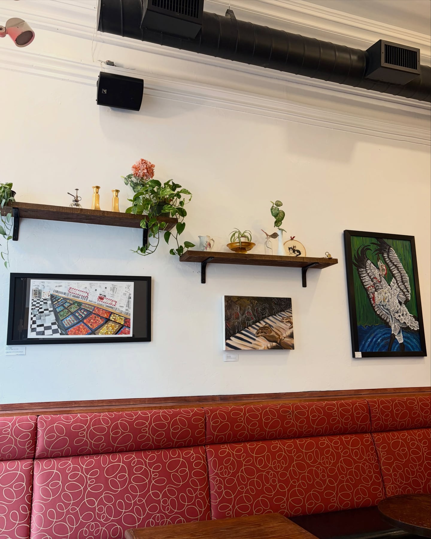 Work from an eight-artist group exhibition displayed at Our Place